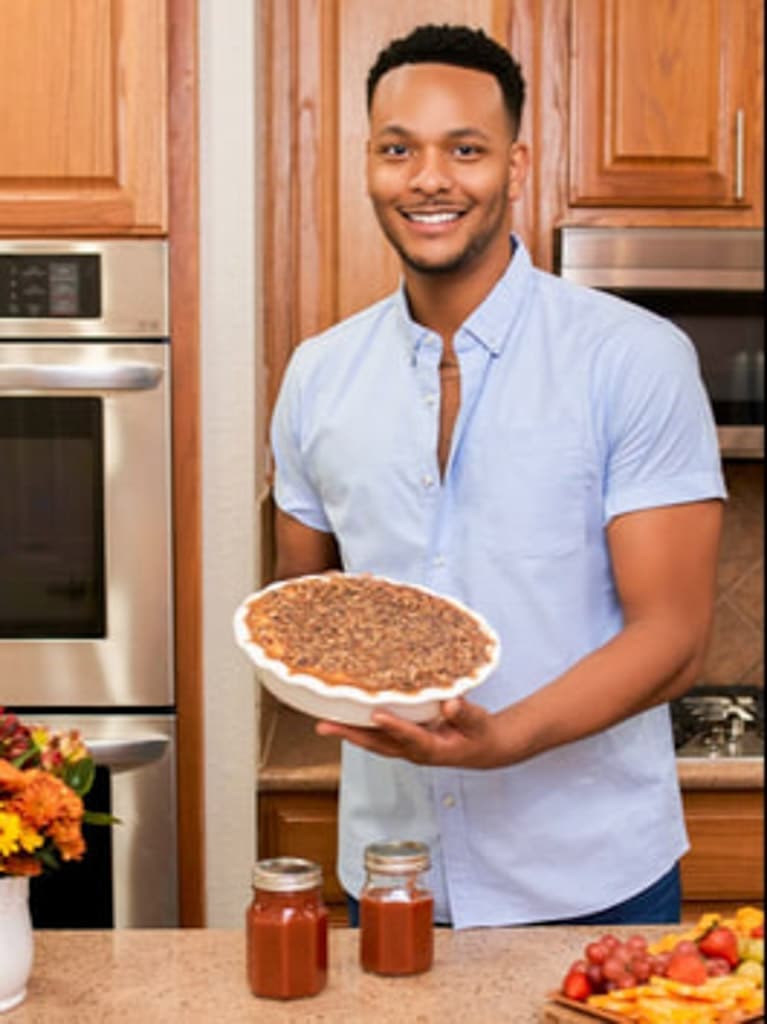 Kolby Kash holding a pecan pie